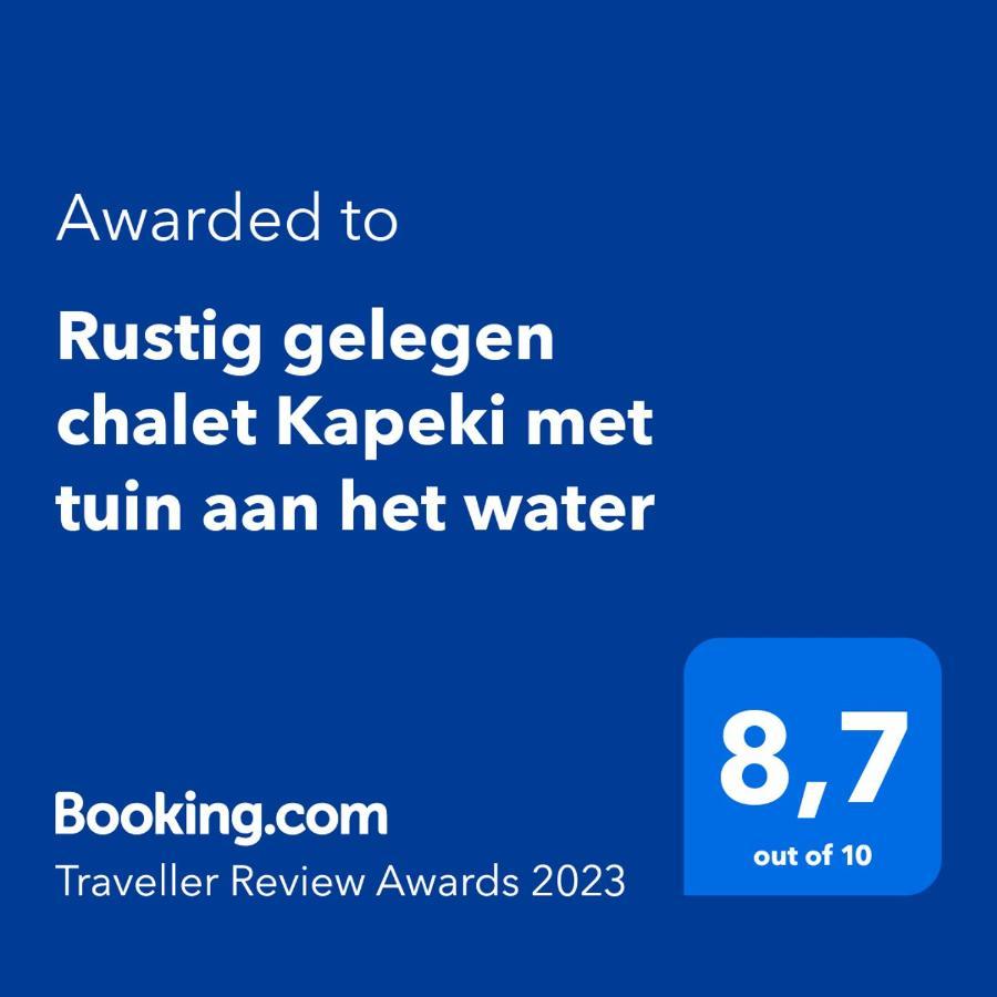 Rustig gelegen chalet Kapeki met tuin aan het water Geel Buitenkant foto
