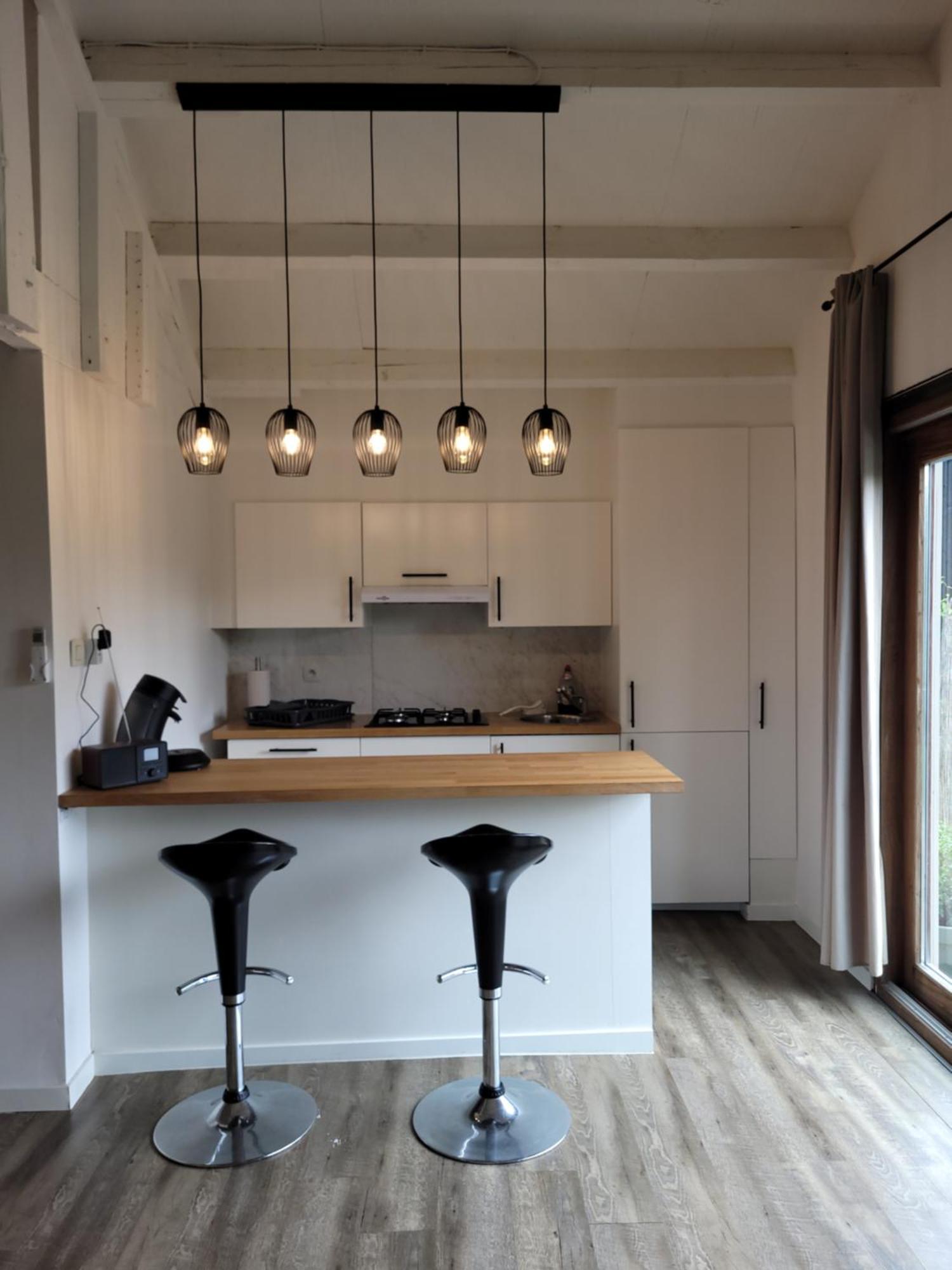 Rustig gelegen chalet Kapeki met tuin aan het water Geel Buitenkant foto